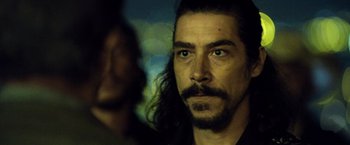 Movie still from “Rambo: Last Blood” (2019), directed by Adrian Grunberg – A person with long hair; Close Up shot, Over the shoulder angle