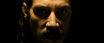 Movie still from “Rambo: Last Blood” (2019), directed by Adrian Grunberg – A man with a mustache; Extreme Close Up shot, Low angle