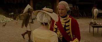 Movie still from “The Last of the Mohicans” (1992), directed by Michael Mann – A man and a woman dressed in period clothing; Medium shot, Over the shoulder angle