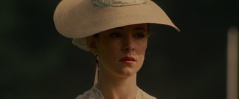 Movie still from “The Last of the Mohicans” (1992), directed by Michael Mann – A person wearing a hat; Close Up shot, Over the shoulder angle