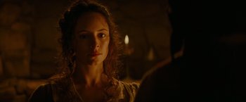 Movie still from “The Last of the Mohicans” (1992), directed by Michael Mann – A young woman is looking into the camera; Close Up shot, Over the shoulder angle