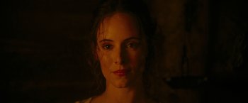 Movie still from “The Last of the Mohicans” (1992), directed by Michael Mann – A woman's face in the dark; Close Up shot, Over the shoulder angle