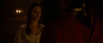 Movie still from “The Last of the Mohicans” (1992), directed by Michael Mann – A woman in a white dress is looking at a man; Close Up shot, Over the shoulder angle