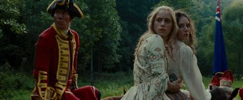 Movie still from “The Last of the Mohicans” (1992), directed by Michael Mann – A woman sitting on top of a horse next to a man; Medium shot, Over the shoulder angle