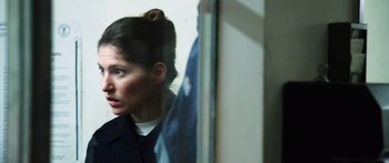 Movie still from “Rampart” (2011), directed by Oren Moverman – Close Up shot, Over the shoulder angle