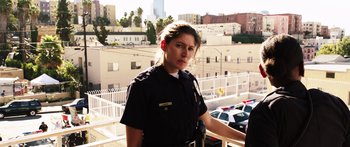 Movie still from “Rampart” (2011), directed by Oren Moverman – Medium shot, Low angle