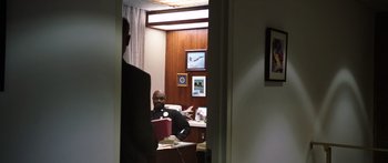 Movie still from “Rampart” (2011), directed by Oren Moverman – Medium shot, Over the shoulder angle