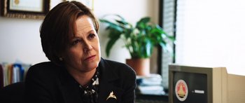 Movie still from “Rampart” (2011), directed by Oren Moverman – Close Up shot, Over the shoulder angle