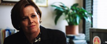 Movie still from “Rampart” (2011), directed by Oren Moverman – Close Up shot, Over the shoulder angle