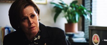 Movie still from “Rampart” (2011), directed by Oren Moverman – Close Up shot, Over the shoulder angle