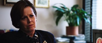 Movie still from “Rampart” (2011), directed by Oren Moverman – Close Up shot, Over the shoulder angle