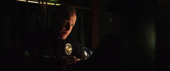 Movie still from “Rampart” (2011), directed by Oren Moverman – Medium shot, Over the shoulder angle