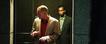 Movie still from “Rampart” (2011), directed by Oren Moverman – Medium shot, Low angle