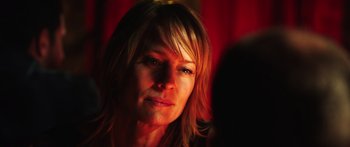 Movie still from “Rampart” (2011), directed by Oren Moverman – Close Up shot, Over the shoulder angle