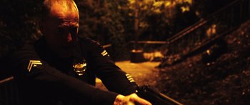 Movie still from “Rampart” (2011), directed by Oren Moverman – Close Up shot, Low angle