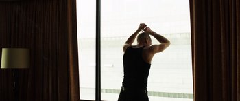 Movie still from “Rampart” (2011), directed by Oren Moverman – Medium shot, Low angle