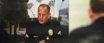 Movie still from “Rampart” (2011), directed by Oren Moverman – Close Up shot, Over the shoulder angle