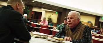 Movie still from “Rampart” (2011), directed by Oren Moverman – Medium shot, Low angle