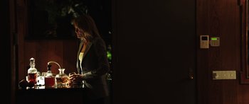 Movie still from “Rampart” (2011), directed by Oren Moverman – Medium shot, Low angle