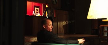 Movie still from “Rampart” (2011), directed by Oren Moverman – Wide shot, Low angle