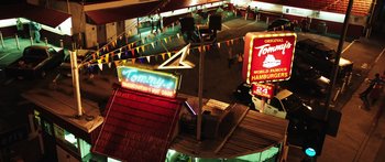 Movie still from “Rampart” (2011), directed by Oren Moverman – Extreme Wide shot, Overhead angle