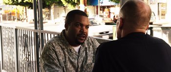 Movie still from “Rampart” (2011), directed by Oren Moverman – Medium shot, Over the shoulder angle