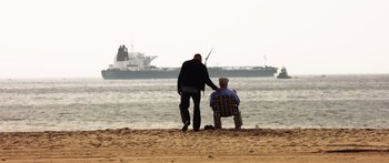 Movie still from “Rampart” (2011), directed by Oren Moverman – Wide shot, Over the shoulder angle