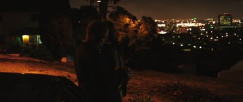 Movie still from “Rampart” (2011), directed by Oren Moverman – Medium shot, Over the shoulder angle