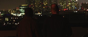 Movie still from “Rampart” (2011), directed by Oren Moverman – Medium shot, Over the shoulder angle