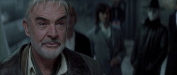 Movie still from “The League of Extraordinary Gentlemen” (2003), directed by Stephen Norrington – A person with a beard; Close Up shot, Over the shoulder angle