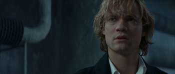 Movie still from “The League of Extraordinary Gentlemen” (2003), directed by Stephen Norrington – A person with blonde hair; Close Up shot, Over the shoulder angle
