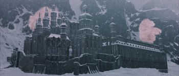 Movie still from “The League of Extraordinary Gentlemen” (2003), directed by Stephen Norrington – A castle with a lot of snow on the ground; Extreme Wide shot, High angle