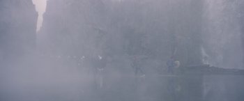 Movie still from “The Legend of Tarzan” (2016), directed by David Yates – A group of people standing on top of a rock formation; Extreme Wide shot, High angle
