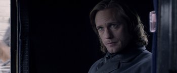 Movie still from “The Legend of Tarzan” (2016), directed by David Yates – A person with long hair; Close Up shot, Over the shoulder angle