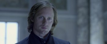 Movie still from “The Legend of Tarzan” (2016), directed by David Yates – A person with long hair; Close Up shot, Over the shoulder angle