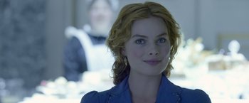 Movie still from “The Legend of Tarzan” (2016), directed by David Yates – A person with curly hair; Close Up shot, Over the shoulder angle