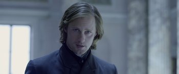 Movie still from “The Legend of Tarzan” (2016), directed by David Yates – A person with long hair; Close Up shot, Over the shoulder angle