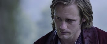 Movie still from “The Legend of Tarzan” (2016), directed by David Yates – A person with long blonde hair; Close Up shot, Low angle