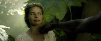Movie still from “The Legend of Tarzan” (2016), directed by David Yates – A woman getting her hair combed by a man; Close Up shot, Over the shoulder angle