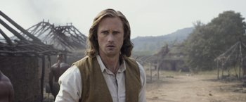 Movie still from “The Legend of Tarzan” (2016), directed by David Yates – A person with long hair; Close Up shot, Over the shoulder angle