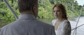 Movie still from “The Legend of Tarzan” (2016), directed by David Yates – A man and a woman standing next to each other near a body of water; Close Up shot, Over the shoulder angle