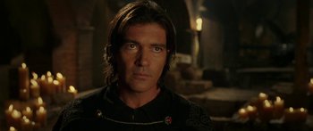 Movie still from “The Legend of Zorro” (2005), directed by Martin Campbell – A person with long brown hair; Close Up shot, Over the shoulder angle