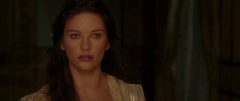 Movie still from “The Legend of Zorro” (2005), directed by Martin Campbell – A person with long black hair; Close Up shot, Over the shoulder angle