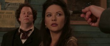 Movie still from “The Legend of Zorro” (2005), directed by Martin Campbell – A woman that is looking into the distance; Close Up shot, Over the shoulder angle