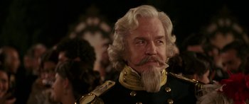 Movie still from “The Legend of Zorro” (2005), directed by Martin Campbell – A man that is dressed in a military uniform; Close Up shot, Over the shoulder angle