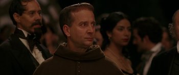 Movie still from “The Legend of Zorro” (2005), directed by Martin Campbell – A person wearing a monk's robe; Close Up shot, Over the shoulder angle