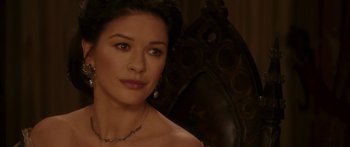 Movie still from “The Legend of Zorro” (2005), directed by Martin Campbell – A person wearing a necklace; Close Up shot, Over the shoulder angle
