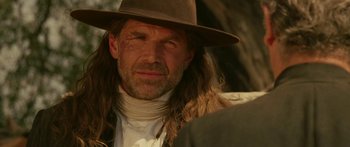 Movie still from “The Legend of Zorro” (2005), directed by Martin Campbell – A person wearing a hat; Close Up shot, Over the shoulder angle