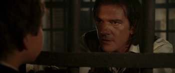 Movie still from “The Legend of Zorro” (2005), directed by Martin Campbell – A person looking at the camera; Close Up shot, Over the shoulder angle