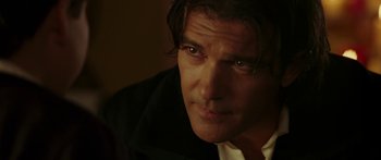 Movie still from “The Legend of Zorro” (2005), directed by Martin Campbell – A person wearing a jacket; Close Up shot, Over the shoulder angle